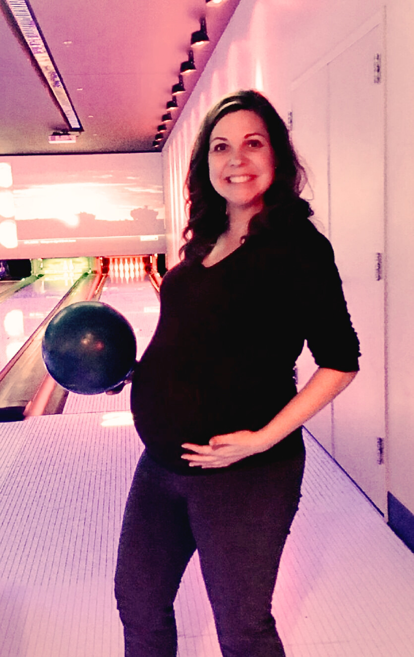 Pregnant woman with a bowling ball